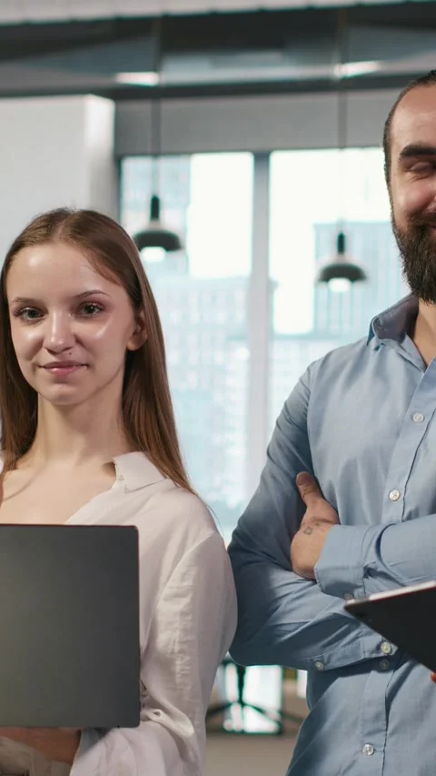 Vertical video Portrait of teamworking engineers writing code, developing Stock Footage 312708065