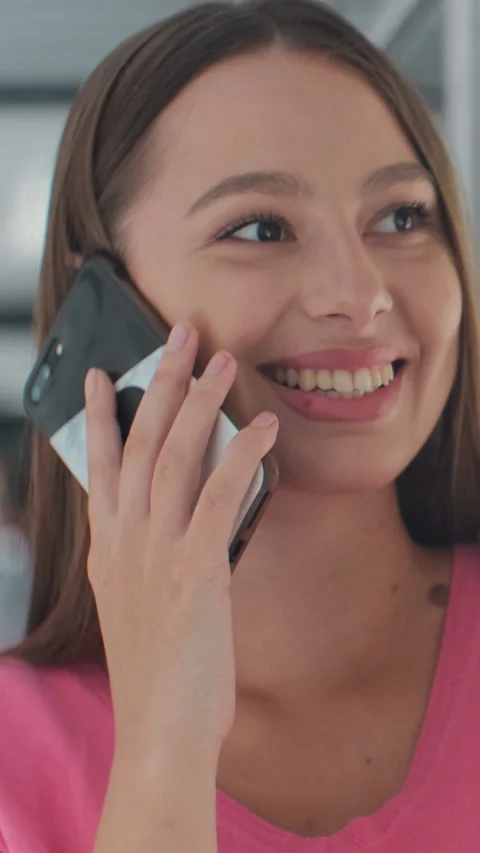 Vertical video. Portrait of a woman using smartphone in a modern tram. Stock Footage 341004458