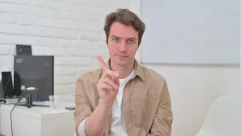 Vertical Video, Portrait, Young Creative Man in Denial Stock Footage 312914530