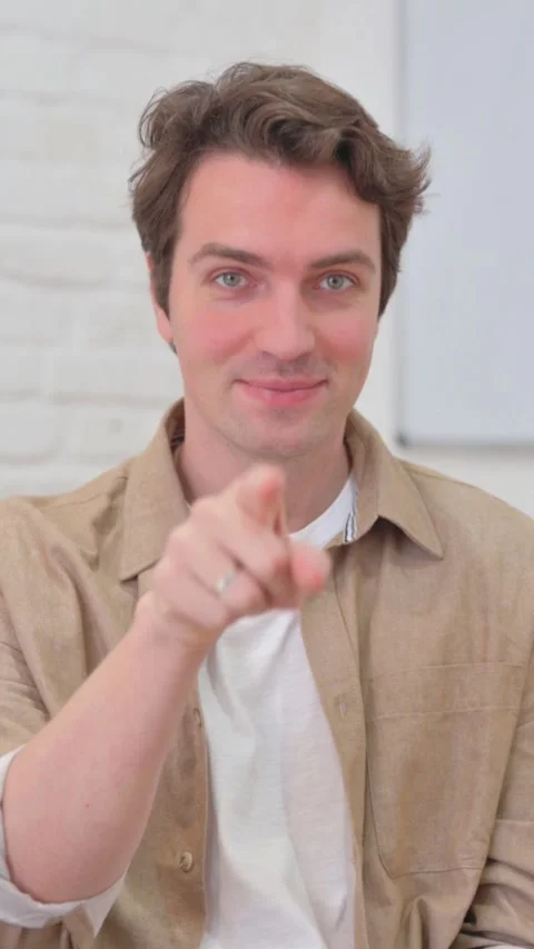 Vertical Video, Portrait, Young Creative Man with Pointing Gesture Stock Footage 318049435