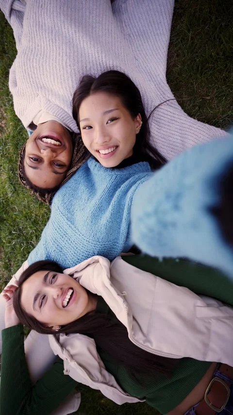 Vertical video Portrait of young pretty asian woman smiling and looking at Stock Footage 221825181