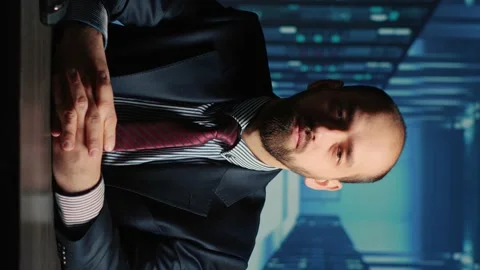 Vertical video: POV of database admin talking on remote videocall Stock Footage 233936081