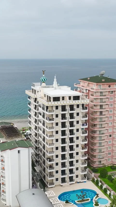 Vertical Video of Premium Villas and Infinity Pool Edge Stock Footage 342369778