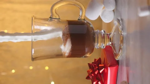 Vertical video of preparing hot chocolate with cream Stock Footage 162560236