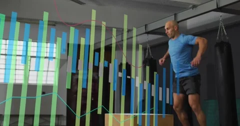 Vertical video: Preparing man in shirt swinging arms jumping from box in gym to Stock Footage 330509187