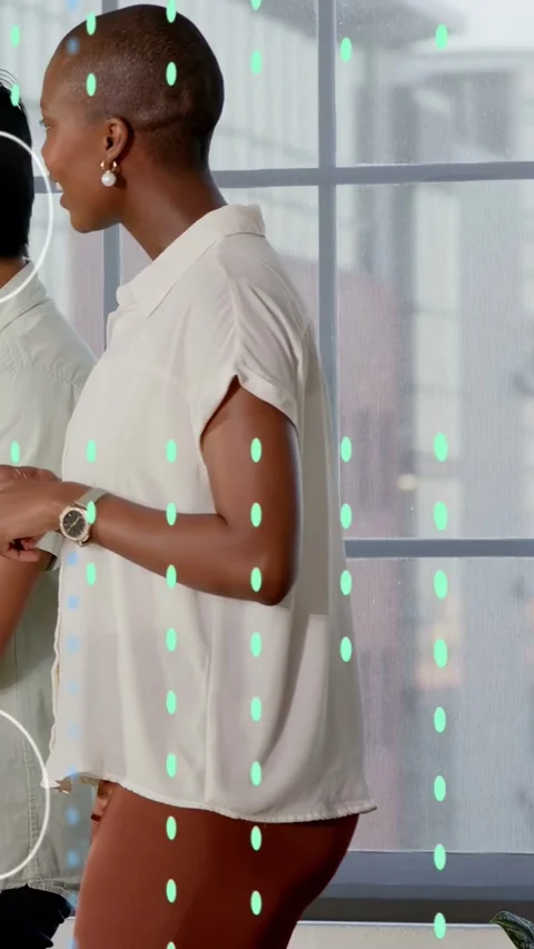 Vertical video: Presenter gesturing to peer at window causing dots and user icon Stock Footage 333496636