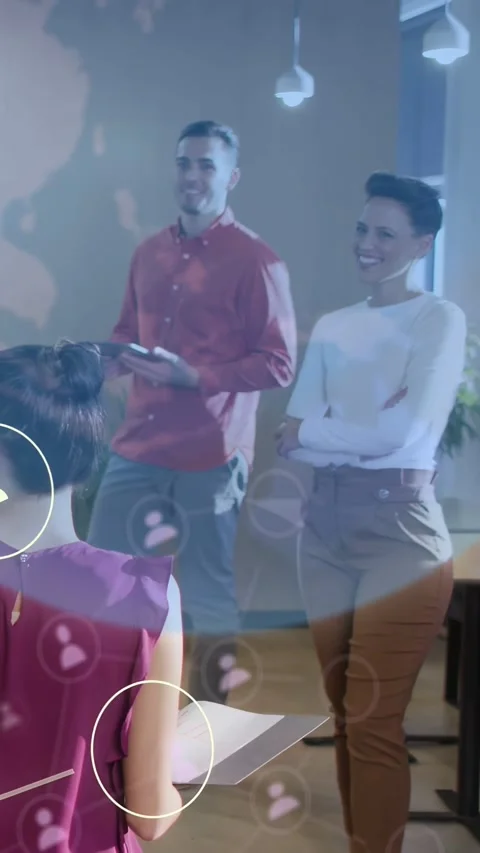 Vertical video: Presenter opening folder making AR icons and grid sweep over Stock Footage 333912803