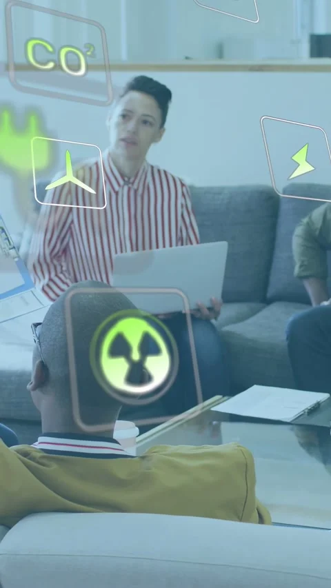 Vertical video: Presenter speaking, causing AR icons over laptop and team, Stock Footage 333513283