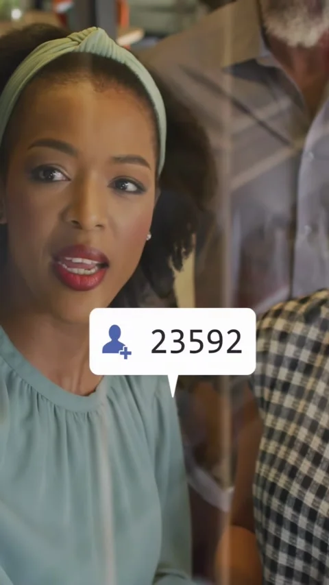 Vertical video: Presenter starting briefing, metric icons popping up showing Stock Footage 334382226
