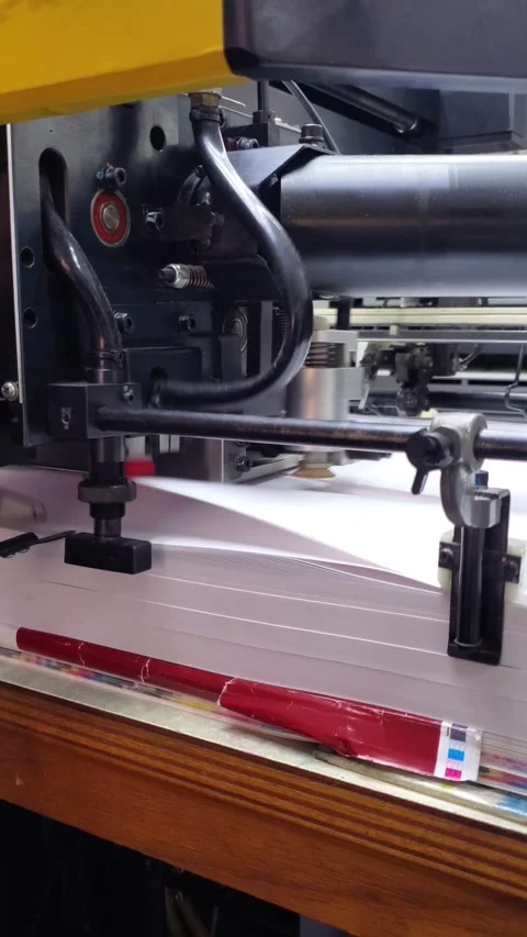 Vertical video of printing press machine working in factory Stock Footage 340266153