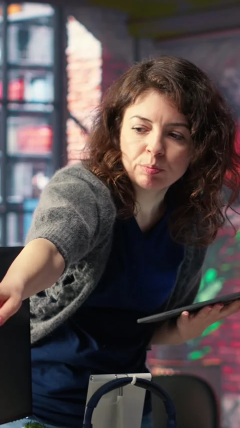 Vertical Video Professional editor uses AI powered software and PC reels in a Stock Footage 308491842