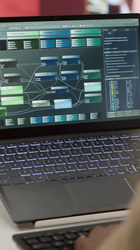 Vertical Video Professional software developer at desk working on AI coding Stock Footage 278375603