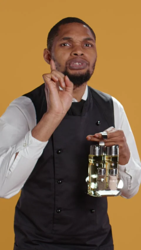 Vertical Video Professional waiter asking clients to wait a bit before serving Stock Footage 279424187