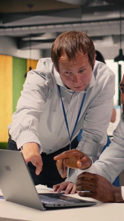 Vertical Video Professional work team discussing project agenda and objectives Stock Footage 329316775