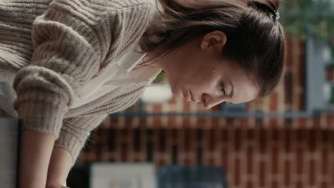 Vertical video Programer typing source code on computer keyboard turning head Stock Footage 194147447