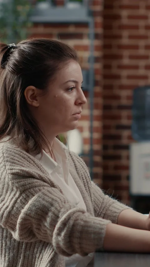 Vertical video Programer typing source code on computer keyboard turning head Stock Footage 201721138