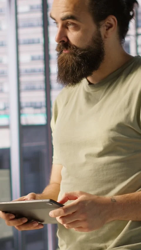 Vertical video Programmer developing machine learning APIs, checking performance Video stock 319474014