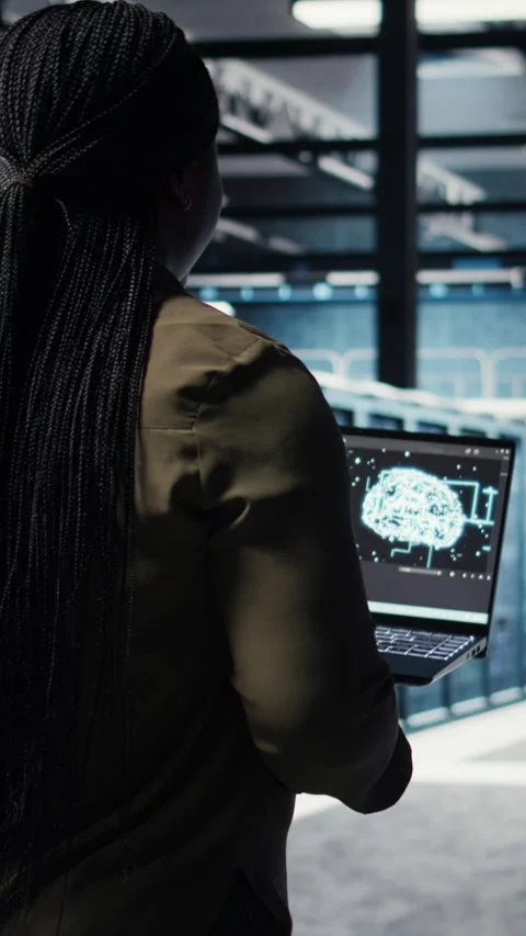 Vertical video Programmer doing data center automation using AI software tools Video stock 316856239