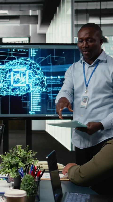 Vertical video Programmer gives presentation to executives, implementing AI Stock Footage 322696359