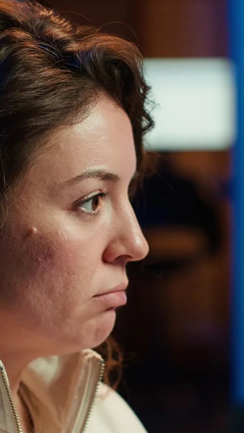 Vertical video Programmer paying attention to PC screen, installing code, close Video stock 283507706