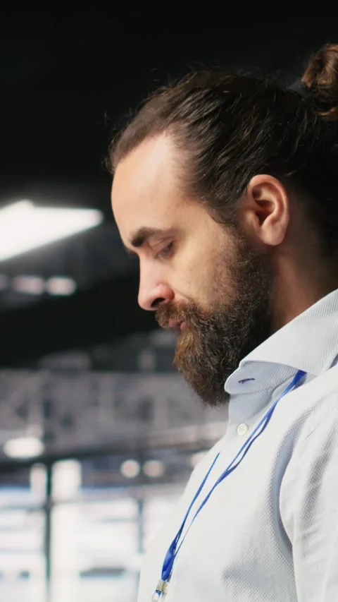 Vertical video Programmers on data center industrial platform checking code on Video stock 310774033