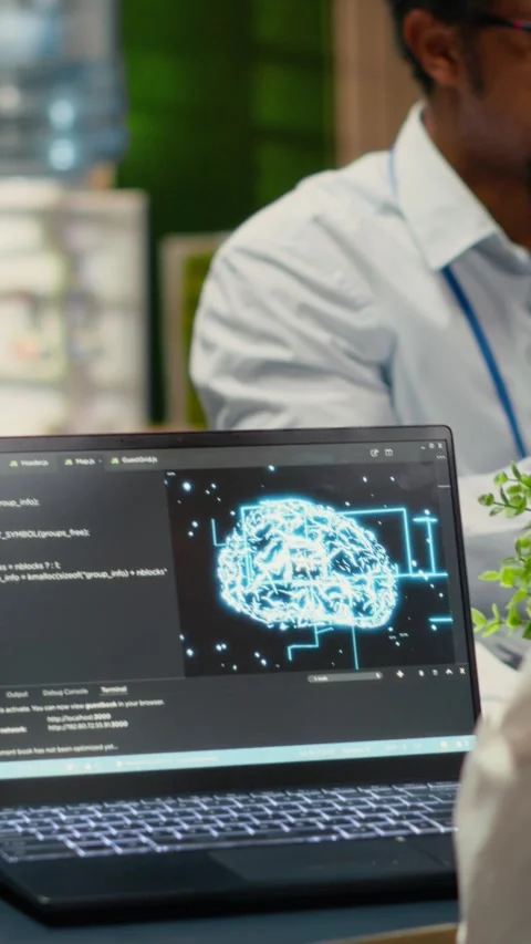 Vertical video Programmers in office using specialized technology to accelerate Stock Footage 323142363