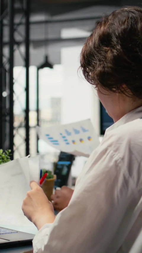 Vertical video Programmers in office using specialized technology to accelerate Stock Footage 323142683