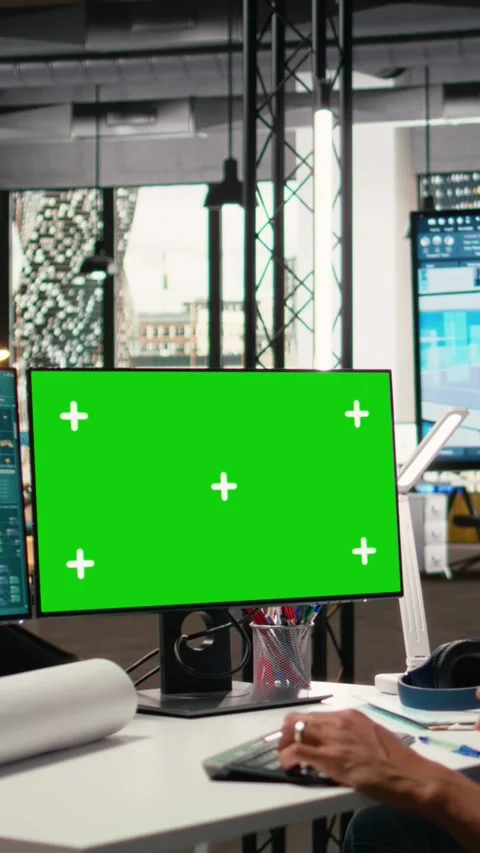 Vertical Video Property developer reviewing architectural blueprints with green Stock Footage 316339120