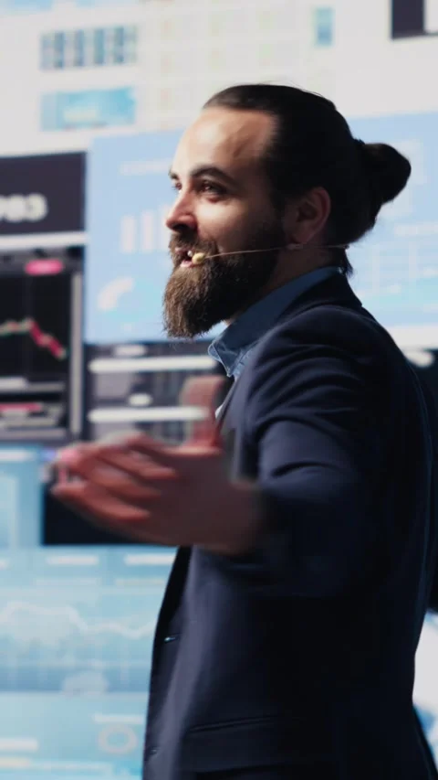 Vertical Video Public speaker CEO hosting business presentation to share a Stock Footage 310704111