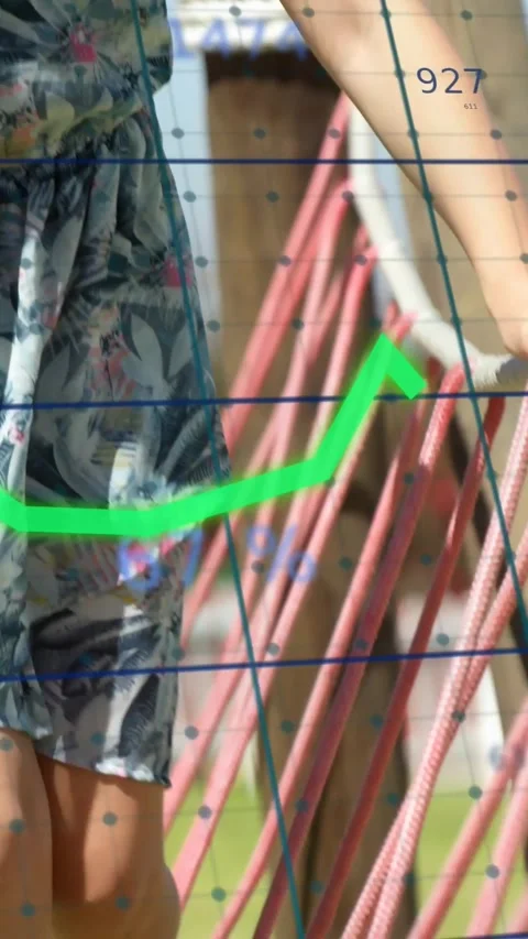 Vertical video: Pullback revealing girl grasping rope and stepping grid zigzag Stock-Footage 331738998
