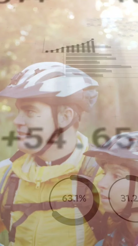 Vertical video: Pullback revealing two riders pausing on trail checking tech, Stock Footage 333650337