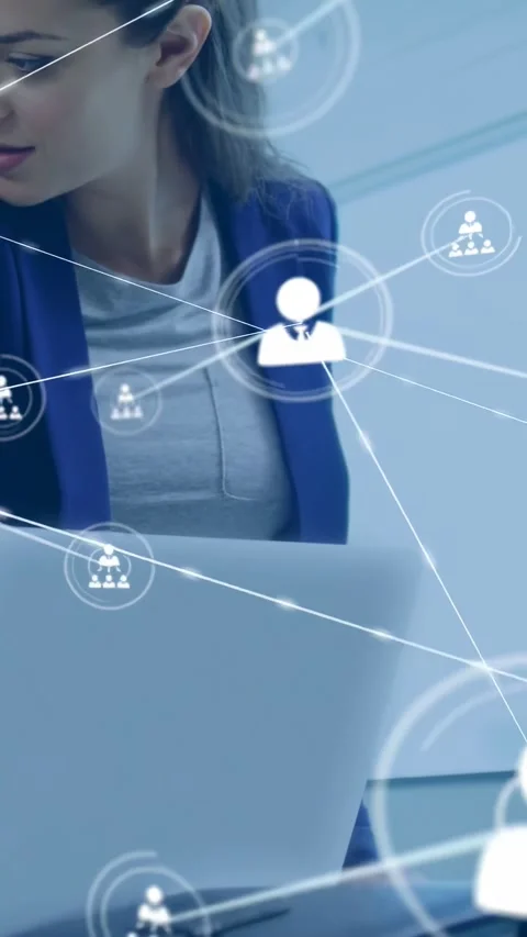 Vertical video: Pullback revealing woman at laptop, user icons expanding, Video stock 334317869