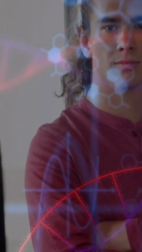 Vertical video: Pullback showing man arms folded, hexagons over face and DNA arc Vídeos de archivo 334317750