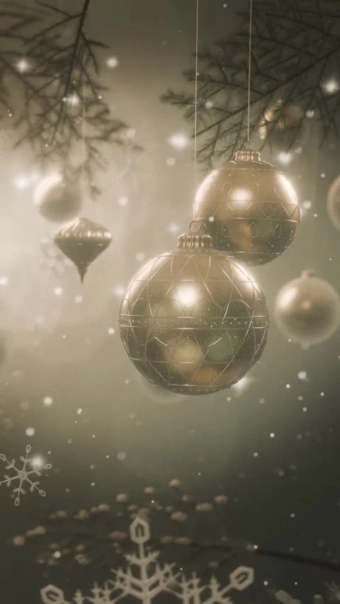 Vertical video: Pulling back revealing gold baubles swaying on pine at festive Stock Footage 346893198