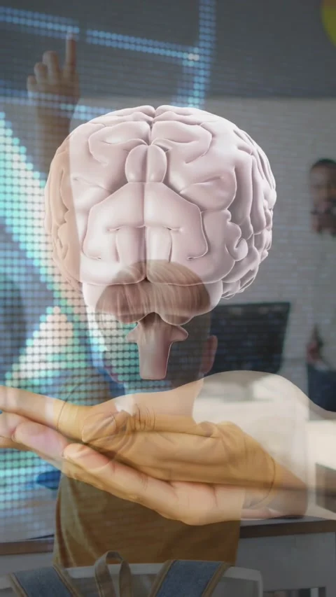 Vertical video: Pupil raising hand in class initiating AR brain rotating above Stock Footage 328308949