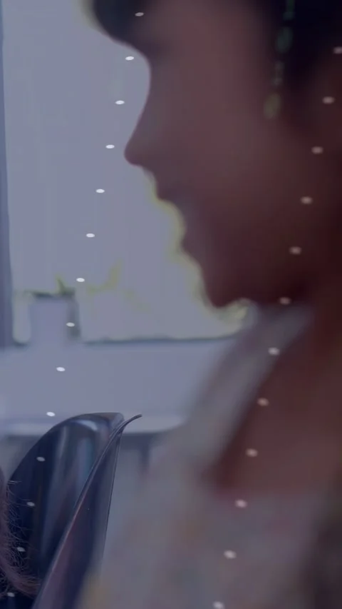 Vertical video: Pupil touching chin in class camera pulling back showing code Stock Footage 333745332