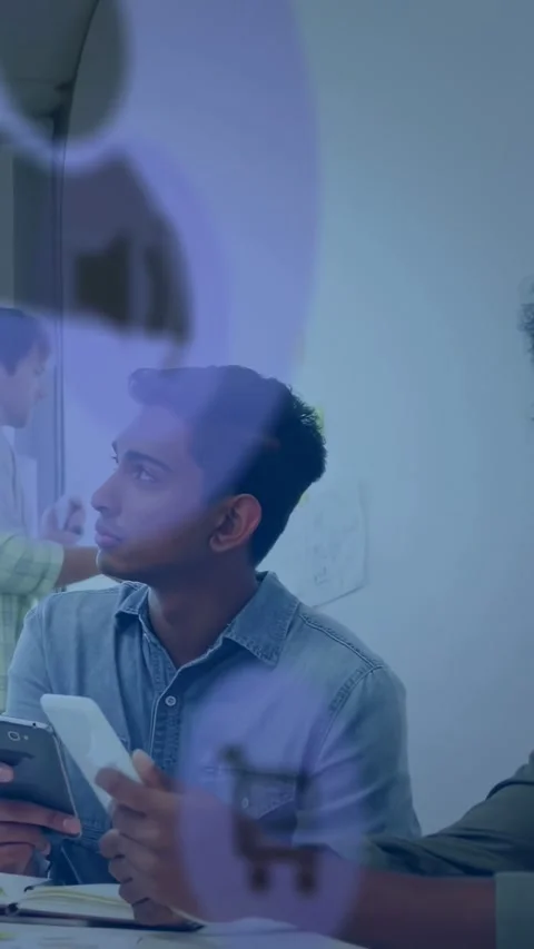 Vertical video: Purple UI drifting across tech, host moving to board, man using Stock Footage 334381918