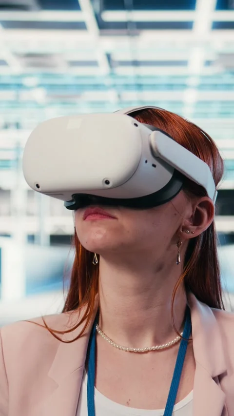 Vertical video Putting VR goggles on, hardware and female technician in server Stock Footage 330028231