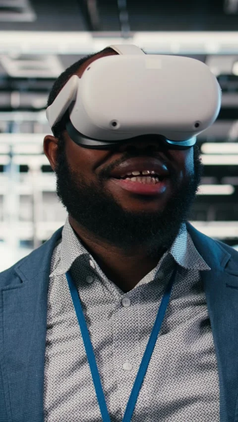 Vertical video Putting on VR headset, network management and employee in server Stock Footage 330138836