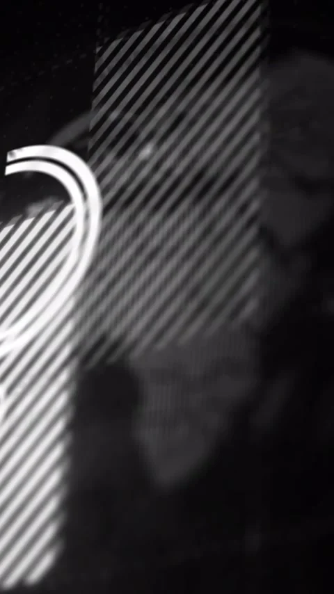 Vertical video: Quilted checked fabric shifting as light causing ring glint Stock Footage 348495930