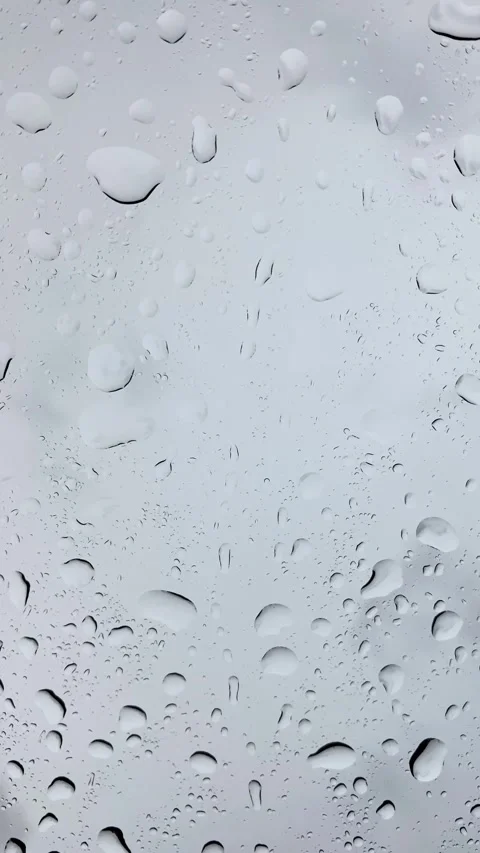 Vertical video of raindrops on a car windshield. Stock Footage 303805070