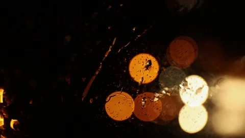 Vertical video. Raindrops on the windshield of a car in motion on a night Video stock 270163230