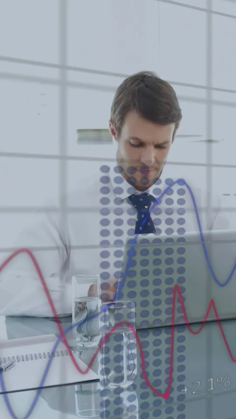 Vertical video: Reacting as charts show, man in tie typing on laptop and Stock Footage 334549635