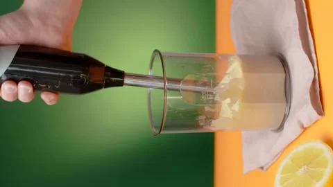 Vertical video recipes: the cook makes homemade mayonnaise by blender Stock Footage 181853482