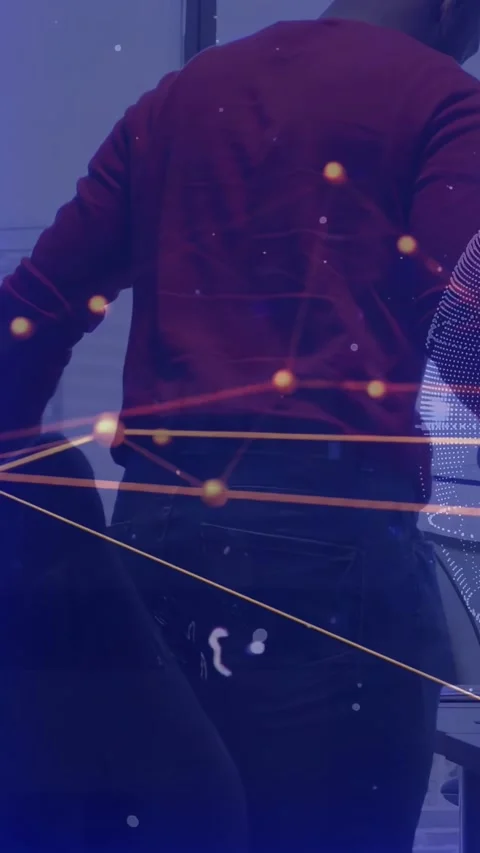 Vertical video: Red man bringing HMD, fitting it on peer for tech demo using PC Stock Footage 337540490