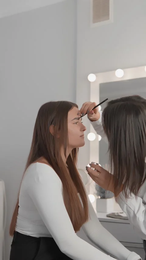 The vertical video reflects exquisite skill used by beautician when applying gel Stock Footage 276313629