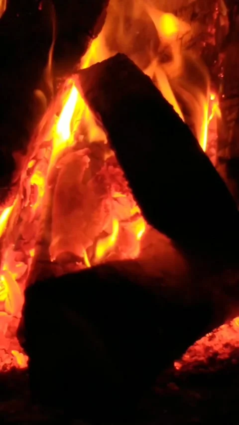 Vertical video of a relaxing fire in a fireplace Stock Footage 171529702