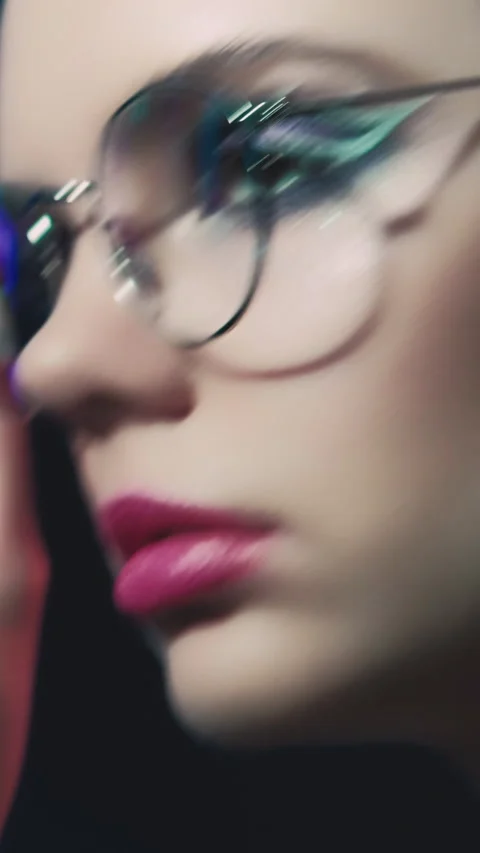 Vertical video retro glasses 90s fashion girl face Stock Footage 231055011