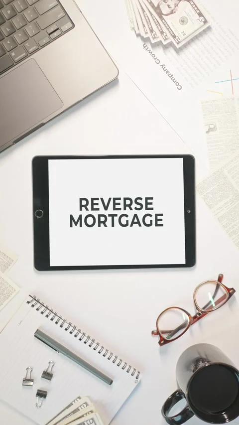 VERTICAL VIDEO OF REVERSE MORTGAGE DISPLAYING ON A TABLET SCREEN Video stock 308079215