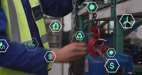 Vertical video: Rigger pulling chain, hooking red hoist to blue load, securing Stock Footage 331109209
